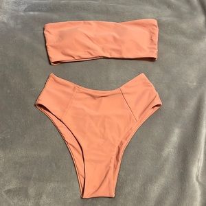 Peach colored swim suit